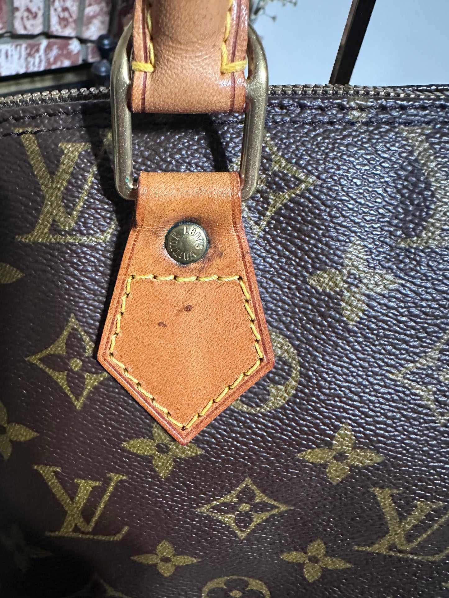 Louis Vuitton Alma PM Monogram Canvas Handbag